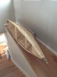 Installed sculpture for the Buckler’s stairway mezzanine, Canoe, 96W x 19H x 22D, mixed media with wood